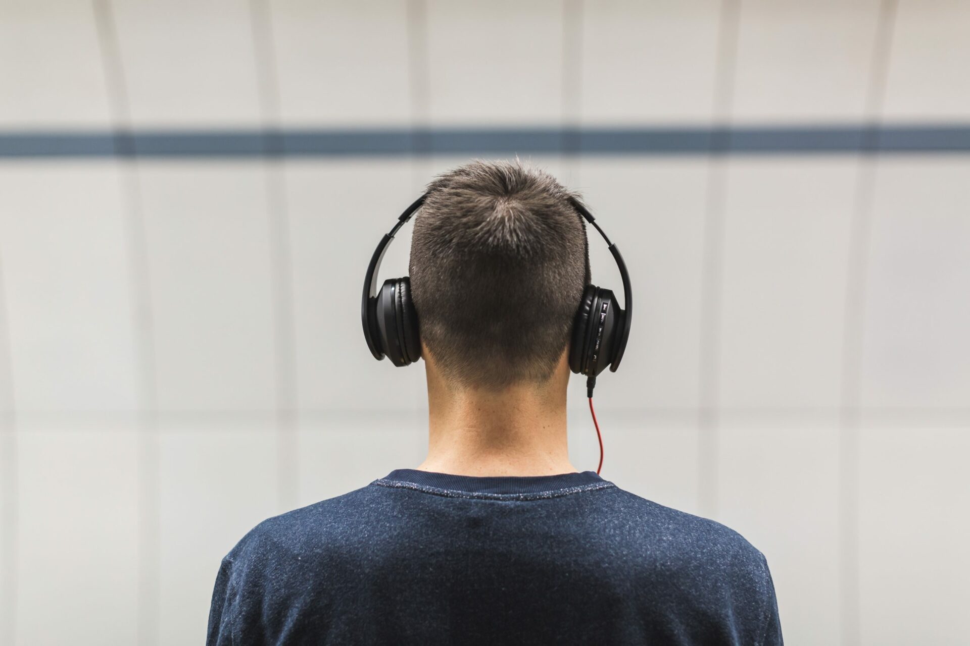 man-wearing-black-headphones-374832